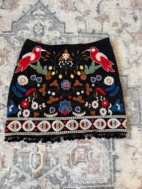 Embroidered Black Mini Skirt with Colorful Floral & Bird Motif